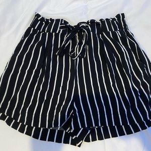 Soft black and white striped shorts with belt, size medium
